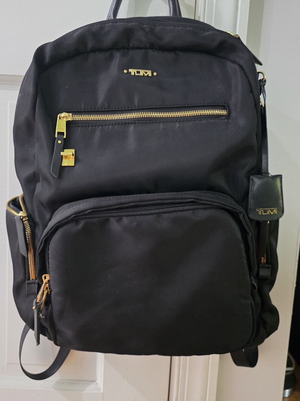 Tumi Voyageor Black Backpack with Gold Hardware Accents